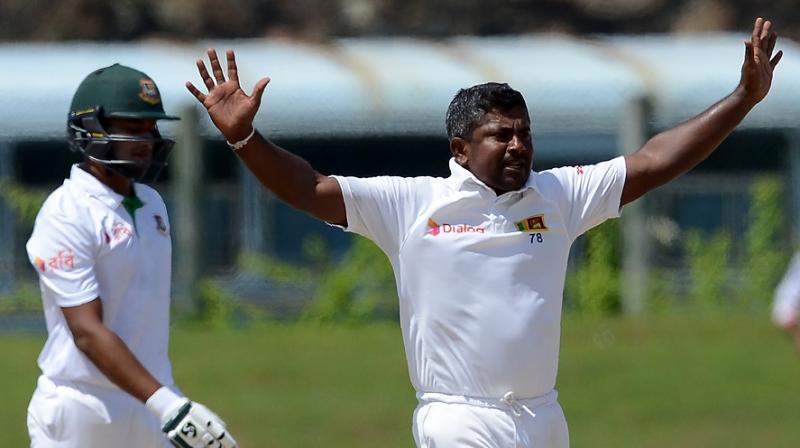 With figures of 6/59, the Rangana Herath ripped through the Bangladesh middle order and ensured the visitors don't have any chance of crossing the line. (Photo: AFP) With figures of 6/59, the Rangana Herath ripped through the Bangladesh middle order and ensured the visitors don't have any chance of crossing the line. (Photo: AFP)