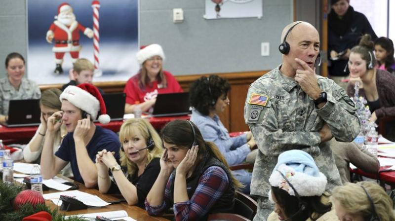 “Here I am saying, ‘Ho, ho, ho, I am Santa,’” said Col. Harry Shoup, who died in 2009. (Representative Image: AP Photo) “Here I am saying, ‘Ho, ho, ho, I am Santa,’” said Col. Harry Shoup, who died in 2009. (Representative Image: AP Photo)