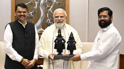 Prime Minister Narendra Modi with Maharashtra Chief Minister Eknath Shinde and Deputy Chief Minister Devendra Fadnavis during their meeting in New Delhi. (PTI)