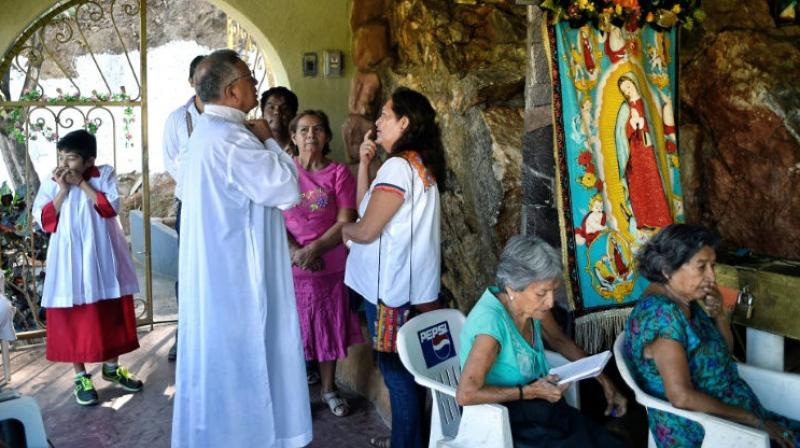 In all, 21 priests have been murdered in Mexico since President Enrique Pena Nieto took office in 2012, according to Church statistics. (Photo: AFP) In all, 21 priests have been murdered in Mexico since President Enrique Pena Nieto took office in 2012, according to Church statistics. (Photo: AFP)