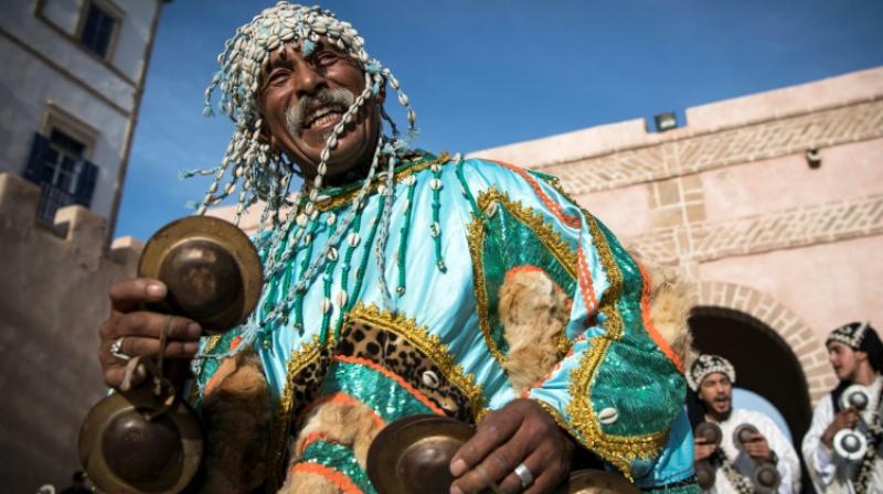 The tradition, which includes the veneration of Islamic holy men, dates back to at least the 16th century and combines ancestral African practices, Arab-Muslim and Berber influences. (Photo: AFP) The tradition, which includes the veneration of Islamic holy men, dates back to at least the 16th century and combines ancestral African practices, Arab-Muslim and Berber influences. (Photo: AFP)