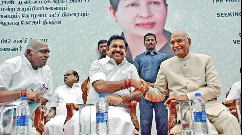 Chief Minister Edappadi K. Palaniswami shakes hands with the NDA presidential candidate Ram Nath Kovind who was in the city on Saturday to seek the support of the ruling AIADMK and other parties for his candidature. Union minister Pon Radhakrishnan also seen. (Photo: DC) Chief Minister Edappadi K. Palaniswami shakes hands with the NDA presidential candidate Ram Nath Kovind who was in the city on Saturday to seek the support of the ruling AIADMK and other parties for his candidature. Union minister Pon Radhakrishnan also seen. (Photo: DC)