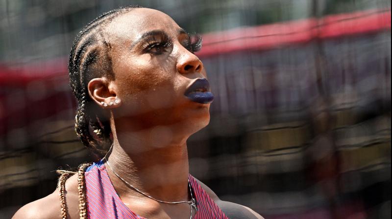 USAs Gwen Berry reacts as she competes in the womens hammer throw qualification during the Olympic Games at the Olympic Stadium in Tokyo on Sunday. (Photo: AFP)