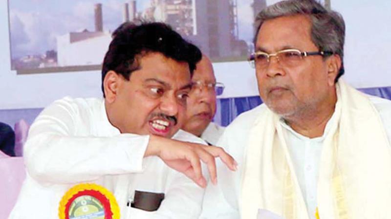 Home Minister M.B. Patil who had reportedly backed Siddaramaiah’s return as CM, with the former CM in a file photo. Home Minister M.B. Patil who had reportedly backed Siddaramaiah’s return as CM, with the former CM in a file photo.