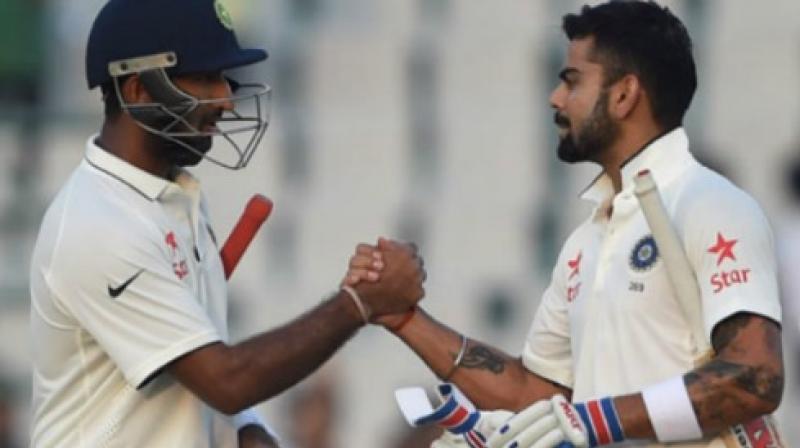 "You know what a valuable player he (Cheteshwar Pujara) is for us. He is the most composed player we have in the team," said Virat Kohli while praising Pujara. (Photo: AFP) "You know what a valuable player he (Cheteshwar Pujara) is for us. He is the most composed player we have in the team," said Virat Kohli while praising Pujara. (Photo: AFP)