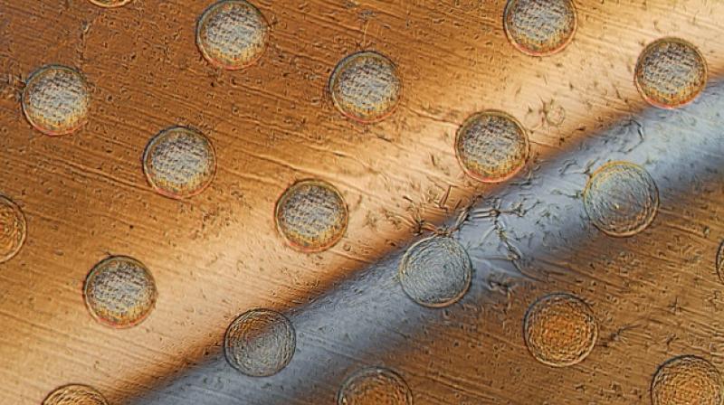 The key to making such tiny devices, which the team calls "syncells" (short for synthetic cells), in large quantities lies in controlling the natural fracturing process of atomically-thin, brittle materials. (Image: Felice Frankel / Via: MIT News) The key to making such tiny devices, which the team calls "syncells" (short for synthetic cells), in large quantities lies in controlling the natural fracturing process of atomically-thin, brittle materials. (Image: Felice Frankel / Via: MIT News)