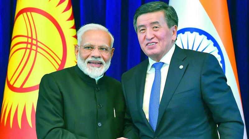 Prime Minister Narendra Modi and Kyrgyz President Sooronbai Jeenbekov at the end of a joint press conference in Bishkek on Friday. (AFP) Prime Minister Narendra Modi and Kyrgyz President Sooronbai Jeenbekov at the end of a joint press conference in Bishkek on Friday. (AFP)