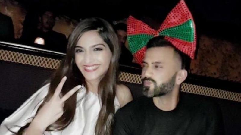 While Sonam flashes her adorable pearlies, Anand seems too smitten by his lady, pouting up endearingly. (Source: Snapchat) While Sonam flashes her adorable pearlies, Anand seems too smitten by his lady, pouting up endearingly. (Source: Snapchat)