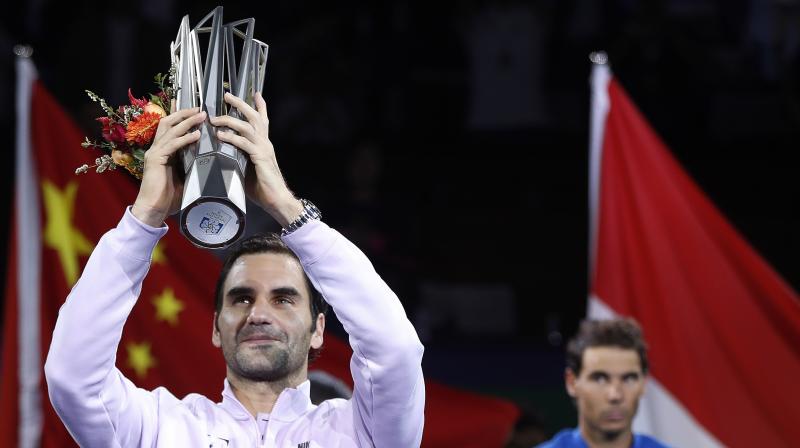 Roger Federer got one over his old rival Rafael Nadal to win the Shanghai Masters 6-4, 6-3. This was a 94th title for the Swiss legend. (Photo: AP) Roger Federer got one over his old rival Rafael Nadal to win the Shanghai Masters 6-4, 6-3. This was a 94th title for the Swiss legend. (Photo: AP)