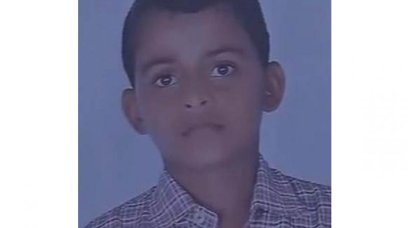 Purshotam Kumar, the 13-yr-old who got crushed to death. (Photo: Twitter | ANI) Purshotam Kumar, the 13-yr-old who got crushed to death. (Photo: Twitter | ANI)