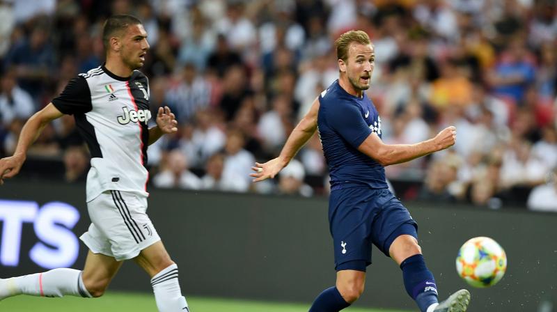 Harry Kane capitalised after team mate Lucas Moura nicked the ball deep into injury time, allowing the striker to thump it from the halfway line high into the steamy night and over the head of Juventus’ back-pedalling goalkeeper Wojciech Szczesny. (Photo:AFP) Harry Kane capitalised after team mate Lucas Moura nicked the ball deep into injury time, allowing the striker to thump it from the halfway line high into the steamy night and over the head of Juventus’ back-pedalling goalkeeper Wojciech Szczesny. (Photo:AFP)