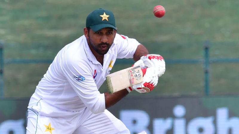 Pakistan captain Sarfraz Ahmed has been taken to hospital and did not take the field on day four of the second Test against Australia after taking a blow to the helmet, while visiting batsman Usman Khawaja was ruled out with a knee injury. (Photo: AFP) Pakistan captain Sarfraz Ahmed has been taken to hospital and did not take the field on day four of the second Test against Australia after taking a blow to the helmet, while visiting batsman Usman Khawaja was ruled out with a knee injury. (Photo: AFP)