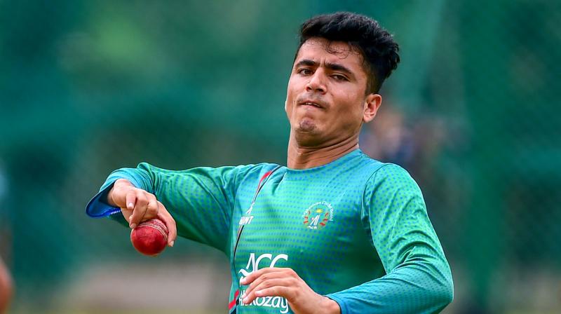 The mystery over Afghanistan cricketer Mujeeb Ur Rahman’s age seems to have been cleared after Asif Khan, the editor of The Dawn apologised for his mistake, saying that he meant Najeeb and not Mujeeb. (Photo: PTI) The mystery over Afghanistan cricketer Mujeeb Ur Rahman’s age seems to have been cleared after Asif Khan, the editor of The Dawn apologised for his mistake, saying that he meant Najeeb and not Mujeeb. (Photo: PTI)