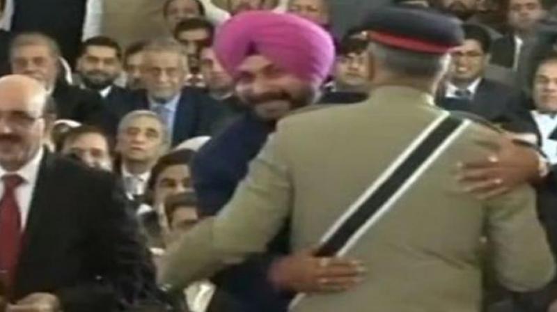 Sidhu was widely criticised for hugging Pakistan Army chief during his visit to Pakistan to attend the swearing-in ceremony of Imran Khan. (Photo: ANI) Sidhu was widely criticised for hugging Pakistan Army chief during his visit to Pakistan to attend the swearing-in ceremony of Imran Khan. (Photo: ANI)