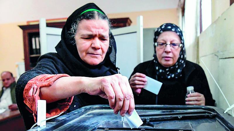 Elderly Egyptian women cast their vote at a polling station at a school in Cairo’s northern neighbourhood of Shubra, on the first day of a three-day poll, on Saturday. (Photo: AFP) Elderly Egyptian women cast their vote at a polling station at a school in Cairo’s northern neighbourhood of Shubra, on the first day of a three-day poll, on Saturday. (Photo: AFP)