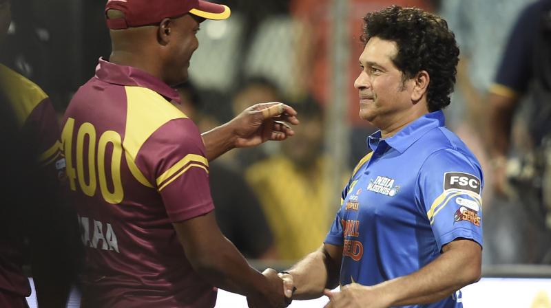 West Indies Legends captain Brian Lara and India Legends captain Sachin Tendulkar after the Road Safety World Series T20 match between the two countries at Wankhede Stadium in Mumbai last Saturday, PTI Photo West Indies Legends captain Brian Lara and India Legends captain Sachin Tendulkar after the Road Safety World Series T20 match between the two countries at Wankhede Stadium in Mumbai last Saturday, PTI Photo