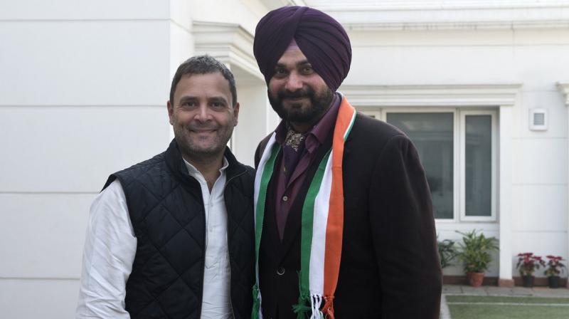 Punjab cabinet minister Navjot Singh Sidhu said he was 'patted on the back' by senior Congress leaders including Shashi Tharoor, Randeep Surjewala and Harish Rawat. (Photo: Twitter | @INCIndia) Punjab cabinet minister Navjot Singh Sidhu said he was 'patted on the back' by senior Congress leaders including Shashi Tharoor, Randeep Surjewala and Harish Rawat. (Photo: Twitter | @INCIndia)