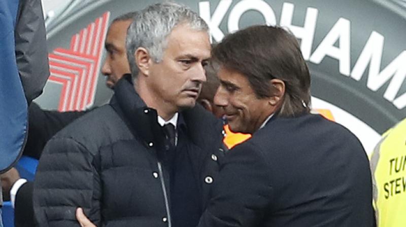When Conte saw the shirt he stopped smiling. (Photo: AP) When Conte saw the shirt he stopped smiling. (Photo: AP)
