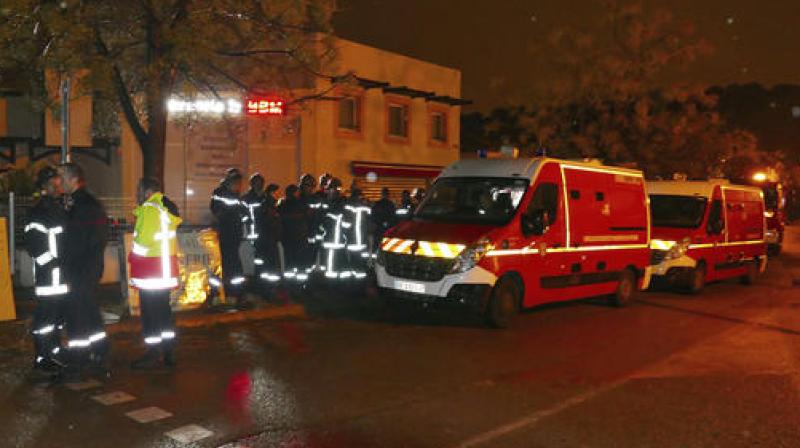 Armed police searched the building but believe the man fled. (Photo: AP) Armed police searched the building but believe the man fled. (Photo: AP)