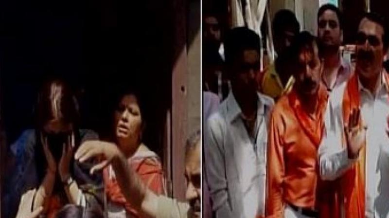 Hindu Yuva Vahini activists on Wednesday assaulted a couple on suspicion of love jihad. (Photo: ANI/Twitter) Hindu Yuva Vahini activists on Wednesday assaulted a couple on suspicion of love jihad. (Photo: ANI/Twitter)