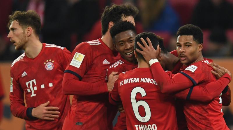 The Bavarians, who trailed Dortmund by nine points back in December, are now top of the table on 60 points, ahead on goal difference, having won 13 of their last 14 league matches. (Photo: AFP) The Bavarians, who trailed Dortmund by nine points back in December, are now top of the table on 60 points, ahead on goal difference, having won 13 of their last 14 league matches. (Photo: AFP)