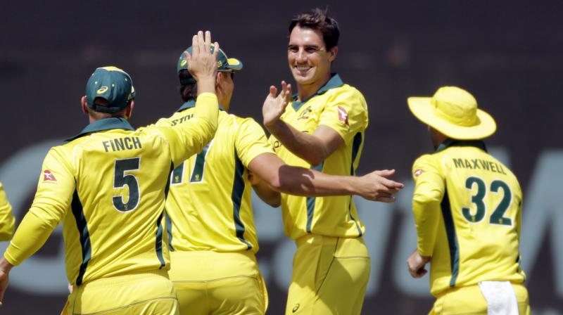 Later Indian bowlers, especially Jasprit Bumrah and Vijay Shankar held their nerves in the death overs to limit Australia to 242. (Photo: AP) Later Indian bowlers, especially Jasprit Bumrah and Vijay Shankar held their nerves in the death overs to limit Australia to 242. (Photo: AP)