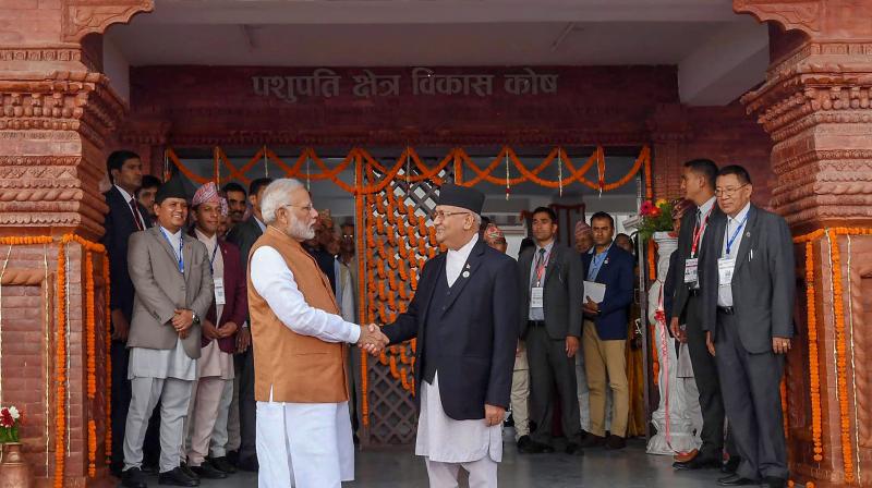 Prime Minister Narendra and Prime Minister of Nepal KP Sharma Oli shake hands at the inauguration of the 'Pashupati Nath Dharamshala' at Tilganga in Kathmandu. (Photo: PTI) Prime Minister Narendra and Prime Minister of Nepal KP Sharma Oli shake hands at the inauguration of the 'Pashupati Nath Dharamshala' at Tilganga in Kathmandu. (Photo: PTI)