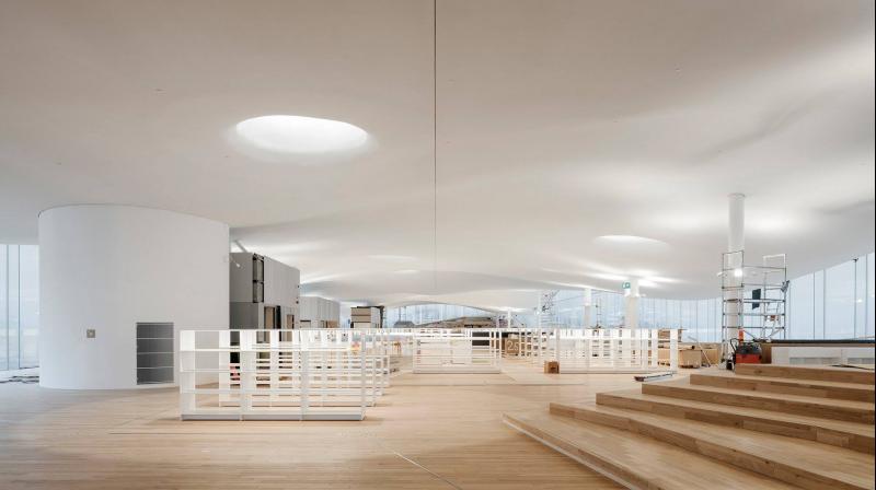 New library was designed by Finnish firm ALA Architects as a welcoming, undulating structure, clad in 160 kilometres' worth (99 miles) of Finnish spruce. (Facebook Screengrab/ @ALAfromHELSINKI) New library was designed by Finnish firm ALA Architects as a welcoming, undulating structure, clad in 160 kilometres' worth (99 miles) of Finnish spruce. (Facebook Screengrab/ @ALAfromHELSINKI)