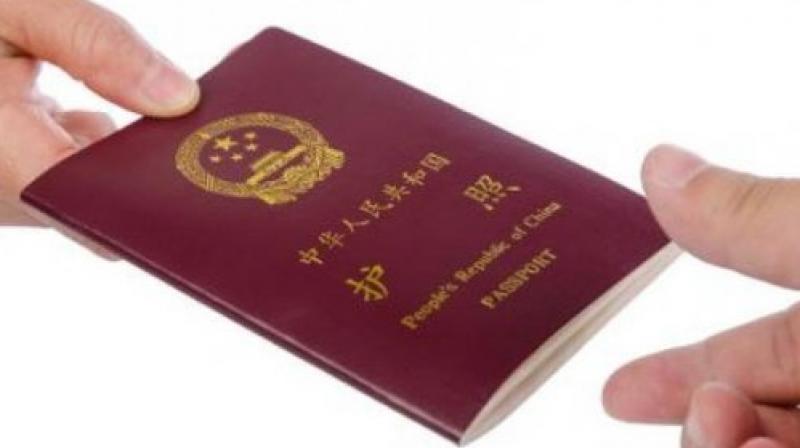 In mid-October, the public security bureau of Shihezi city posted a directive on a verified social media account asking residents to hand in their passports to police. (Photo: Representational Image/AFP) In mid-October, the public security bureau of Shihezi city posted a directive on a verified social media account asking residents to hand in their passports to police. (Photo: Representational Image/AFP)