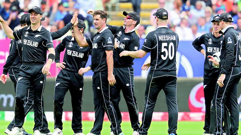 New Zealand players celebrate a South African wicket during their match at Edgbaston in Birmingham on Wednesday in this file photo. They are yet to lose a game in the tournament. (Photo: AP) New Zealand players celebrate a South African wicket during their match at Edgbaston in Birmingham on Wednesday in this file photo. They are yet to lose a game in the tournament. (Photo: AP)