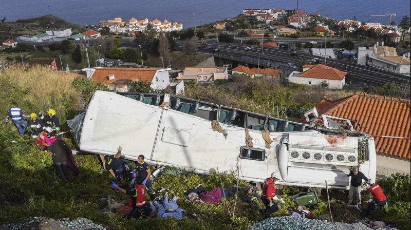 Drone footage of the aftermath of the accident showed the badly mangled wreckage of the bus resting precariously on its side. (Photo:AP) Drone footage of the aftermath of the accident showed the badly mangled wreckage of the bus resting precariously on its side. (Photo:AP)