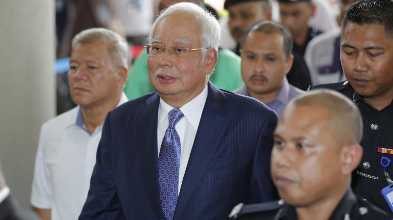 The 65-year-old took his seat in the dock and pleaded not guilty to seven charges of corruption and money laundering. (Photo:AP) The 65-year-old took his seat in the dock and pleaded not guilty to seven charges of corruption and money laundering. (Photo:AP)
