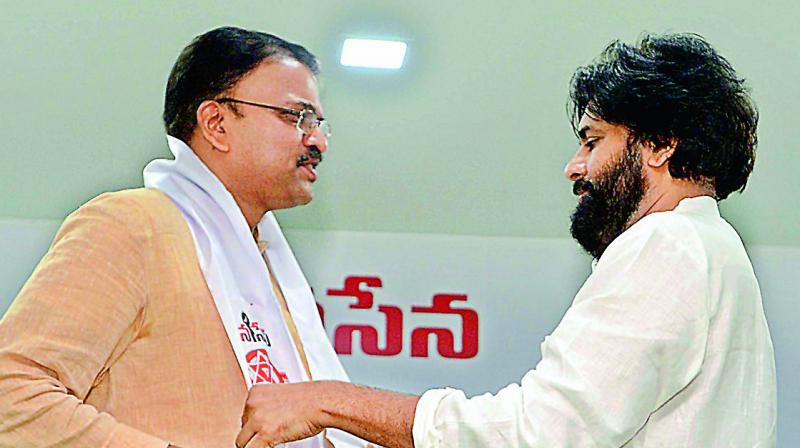 Jana Sena chief Pawan Kalyan welcomes former CBI joint director V.V. Lakshminarayana to his party on Sunday. Jana Sena chief Pawan Kalyan welcomes former CBI joint director V.V. Lakshminarayana to his party on Sunday.