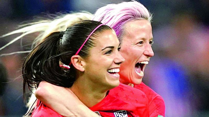 United States forward Alex Morgan (left) and Megan Rapinoe celebrate a goal during the Women’s World Cup Group ‘F’ football match against Thailand at the Auguste-Delaune Stadium in Reims, eastern France, on Wednesday. (Photo: AFP) United States forward Alex Morgan (left) and Megan Rapinoe celebrate a goal during the Women’s World Cup Group ‘F’ football match against Thailand at the Auguste-Delaune Stadium in Reims, eastern France, on Wednesday. (Photo: AFP)