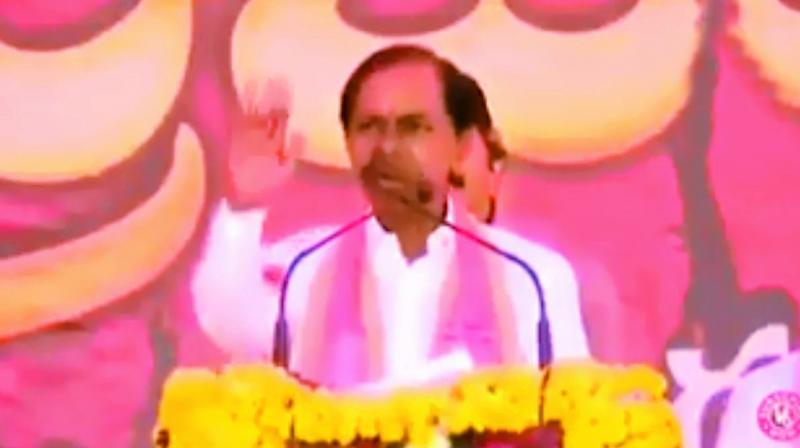 A screengrab of K. Chandrasekhar Rao admonishing a person from the crowd for asking a question on 12 per cent reservation for minorities. A screengrab of K. Chandrasekhar Rao admonishing a person from the crowd for asking a question on 12 per cent reservation for minorities.