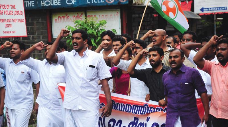 Youth Congress activists stage a protest march to the Thrissur range IG office on Friday seeking proper investigation into the rape allegations made by a young woman against CPM leaders. (Photo: ANUP K. VENU) Youth Congress activists stage a protest march to the Thrissur range IG office on Friday seeking proper investigation into the rape allegations made by a young woman against CPM leaders. (Photo: ANUP K. VENU)