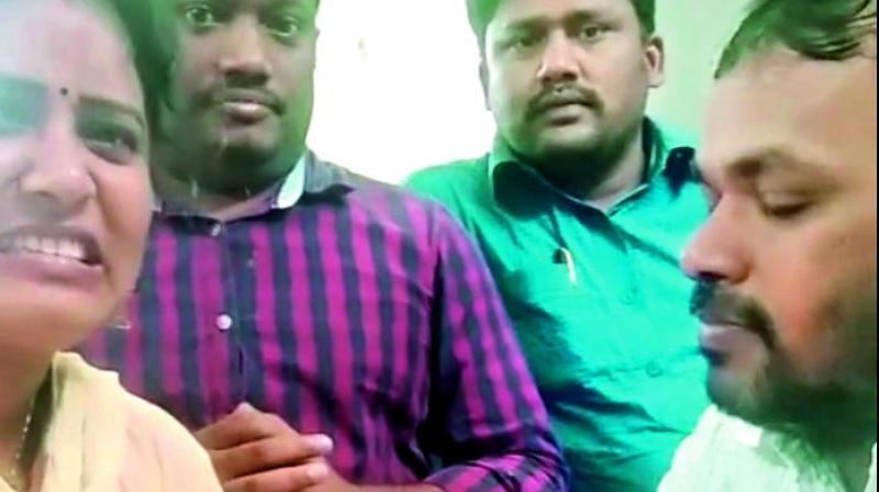 Khammam municipal staff in a viral TikTok video. Khammam municipal staff in a viral TikTok video.