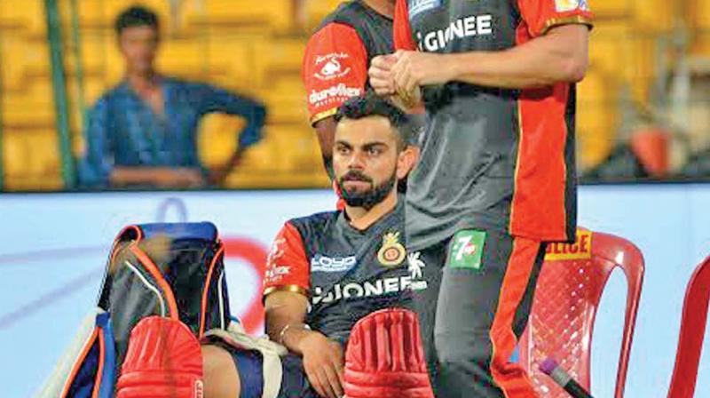 RCB’s Virat Kohli (left) and stand-in captain Shane Watson at a practice session in Bengaluru. (Photo: SHASHIDHAR B) RCB’s Virat Kohli (left) and stand-in captain Shane Watson at a practice session in Bengaluru. (Photo: SHASHIDHAR B)