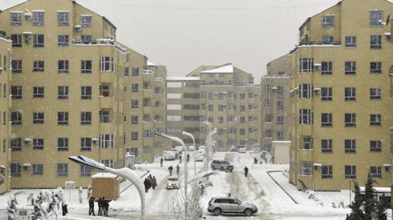 Residents navigate icy streets during a snowfall in Kabul, Afghanistan. (Photo: AP) Residents navigate icy streets during a snowfall in Kabul, Afghanistan. (Photo: AP)