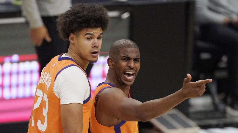 Phoenis Suns' Chris Paul (right) in a file picture. (Photo: AP) Phoenis Suns' Chris Paul (right) in a file picture. (Photo: AP)