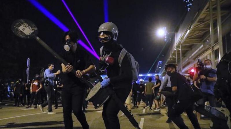 Nick, 20, met Abby, a year his junior, at university in June as debate on an extradition bill to China began to fizz. (Photo: AP) Nick, 20, met Abby, a year his junior, at university in June as debate on an extradition bill to China began to fizz. (Photo: AP)
