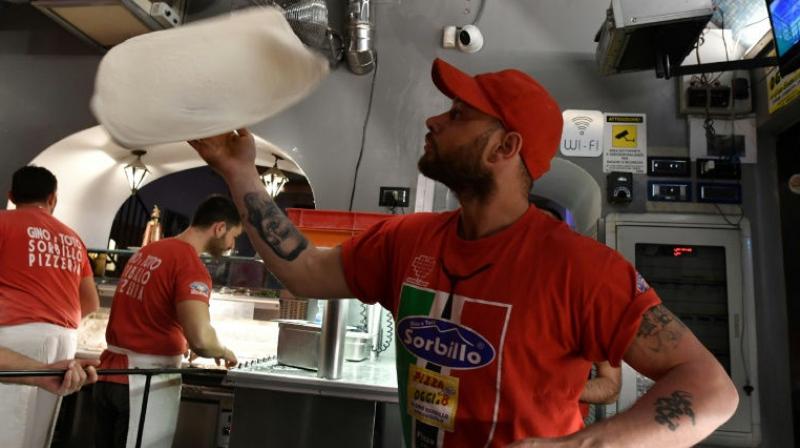 Result comes after some two million people signed a petition to support Naples' application, according to Sergio Miccu, head of the Association of Neapolitan Pizzaiuoli. (Photo: AFP) Result comes after some two million people signed a petition to support Naples' application, according to Sergio Miccu, head of the Association of Neapolitan Pizzaiuoli. (Photo: AFP)