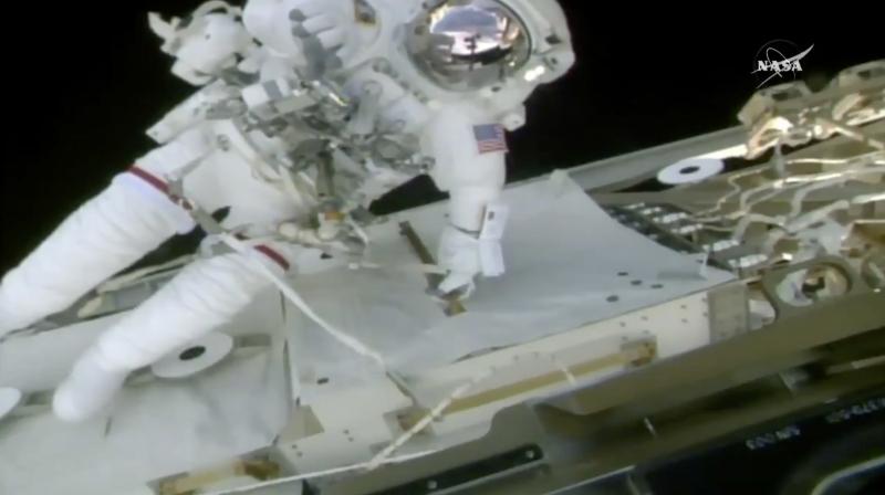 Vande Hei and station commander Randy Bresnik replaced the latching mechanism on one end of the 58-foot robot arm. Vande Hei and station commander Randy Bresnik replaced the latching mechanism on one end of the 58-foot robot arm.