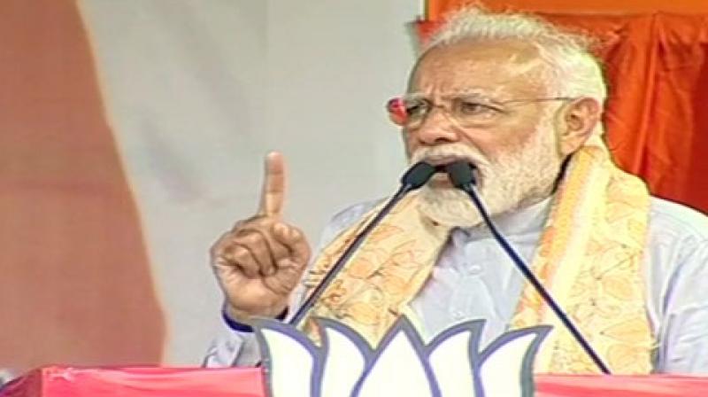 Prime Minister Narendra Modi in a rally at Asansol in West Bengal on Tuesday. (Photo: ANI) Prime Minister Narendra Modi in a rally at Asansol in West Bengal on Tuesday. (Photo: ANI)