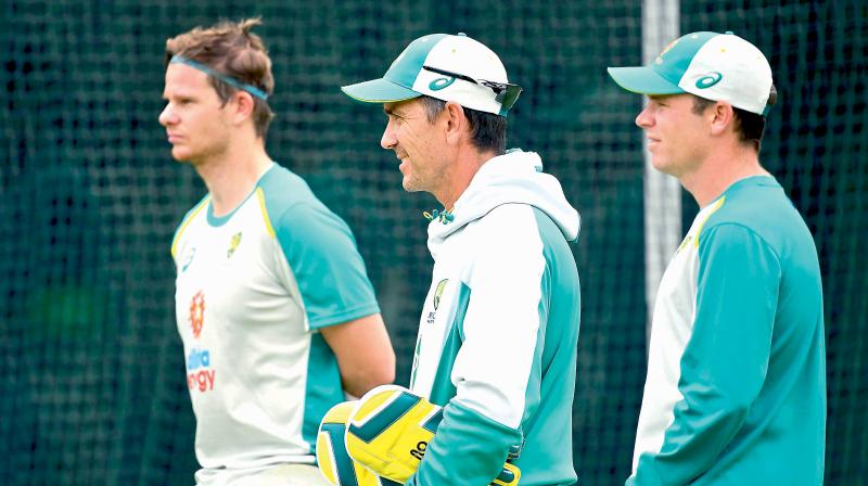 Australia batsman Steve Smith alongside head coach Justin Langar. (Photo: AFP)