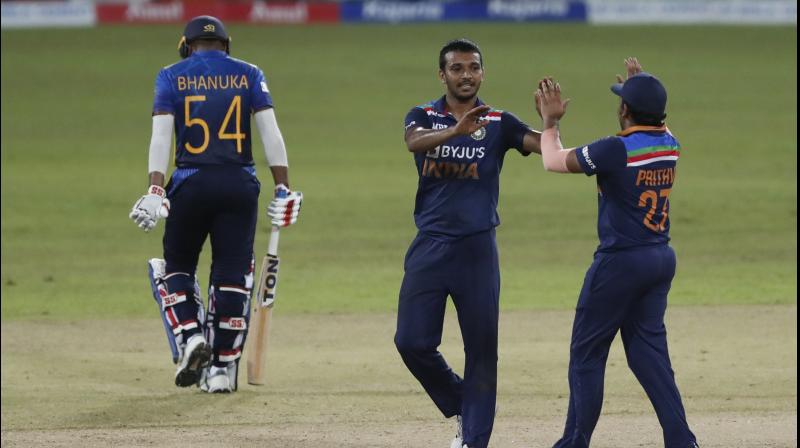 Indias bowler Chetan Sakariya, center, celebrate the dismissal of Sri Lankas batsman Bhanuka Rajapaksa with team mate Prithvi Shaw during the third one day international cricket match between Sri Lanka and India in Colombo, Sri Lanka, Friday, July 23, 2021. (PTI Photo)