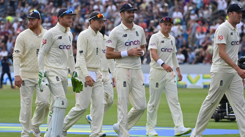 Englands James Anderson (C) and the rest of the England platers leave the field at the end of Indias first innings on the first day of the third cricket Test match between England and India at Headingley cricket ground in Leeds on Wednesday. (Photo: AFP)