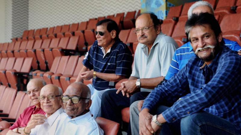 (L-R) Madhav Mantri, Bapu Nadkarni Vasu Paranjpe, Madhav Apte, Umesh Kulkarni, Ajit Wadekar and Sandeep Patil at the Wankhede Stadium in Mumbai. (Photo: PTI)