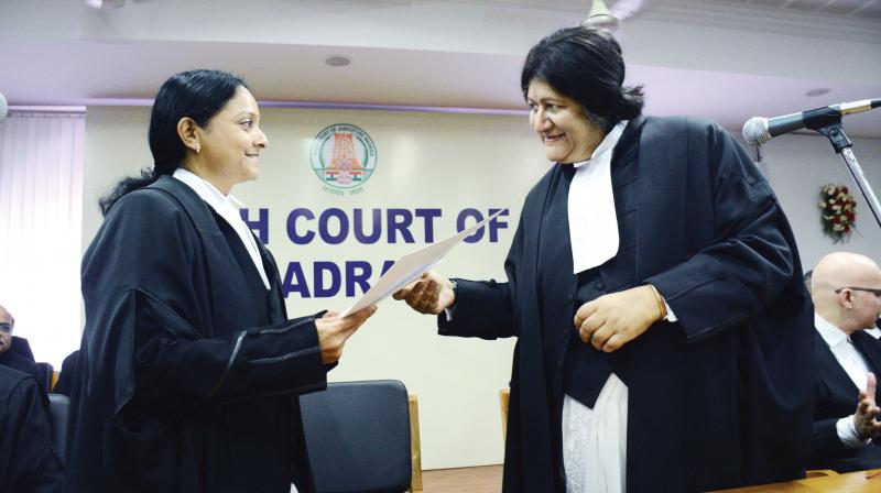 Madras HC Chief Justice Indira Banerjee (right) greets Justice R. Hemalatha after administering oath to her. (Photo: DC) Madras HC Chief Justice Indira Banerjee (right) greets Justice R. Hemalatha after administering oath to her. (Photo: DC)