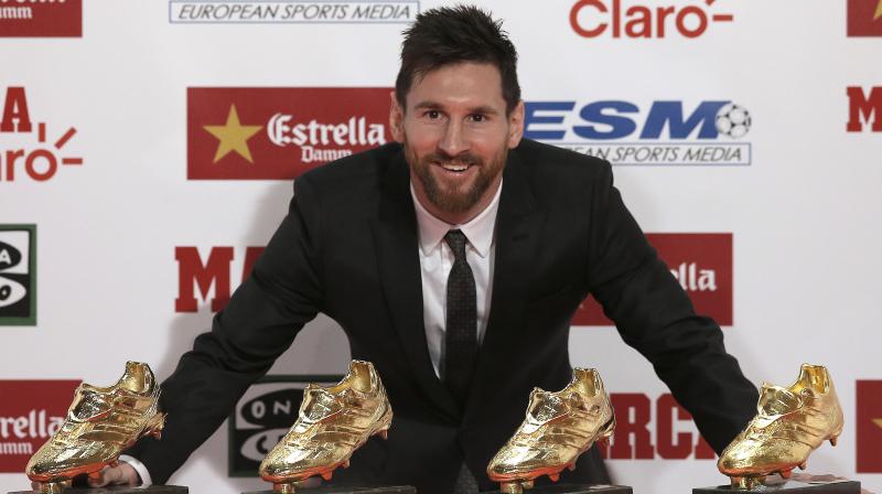 With Lionel Messi's 700 million euro ($834 million) buyout clause, Barcelona could potentially buy nine of the 20 most expensive teams in the world. (Photo: AP) With Lionel Messi's 700 million euro ($834 million) buyout clause, Barcelona could potentially buy nine of the 20 most expensive teams in the world. (Photo: AP)